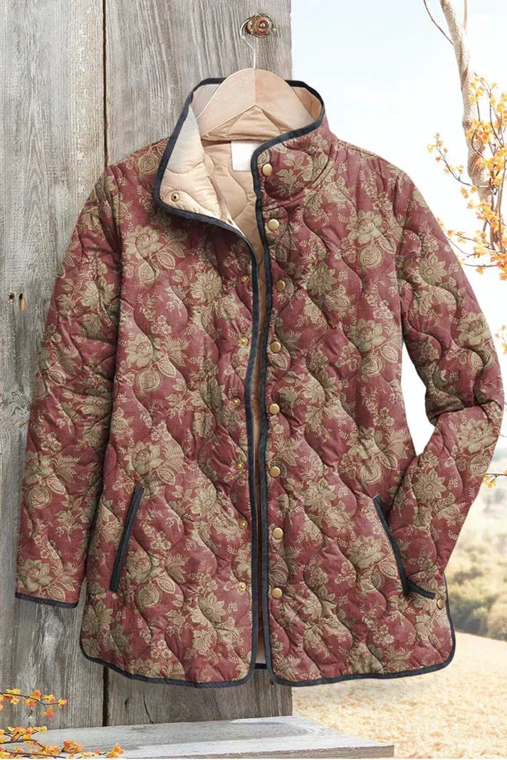 Berit™ | Giacca trapuntata con fiori in rosso ruggine